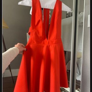 Mini open back ruffled red dress